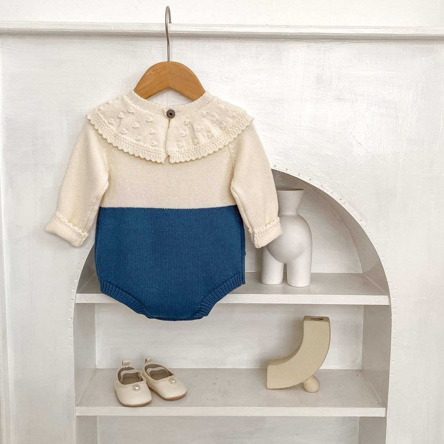 ヨーロピアンバイカラーニットロンパース