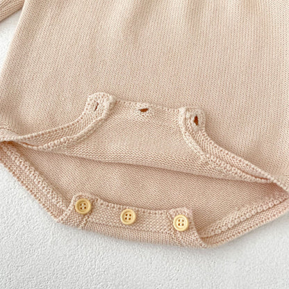 パステルピンクフリルニットロンパース