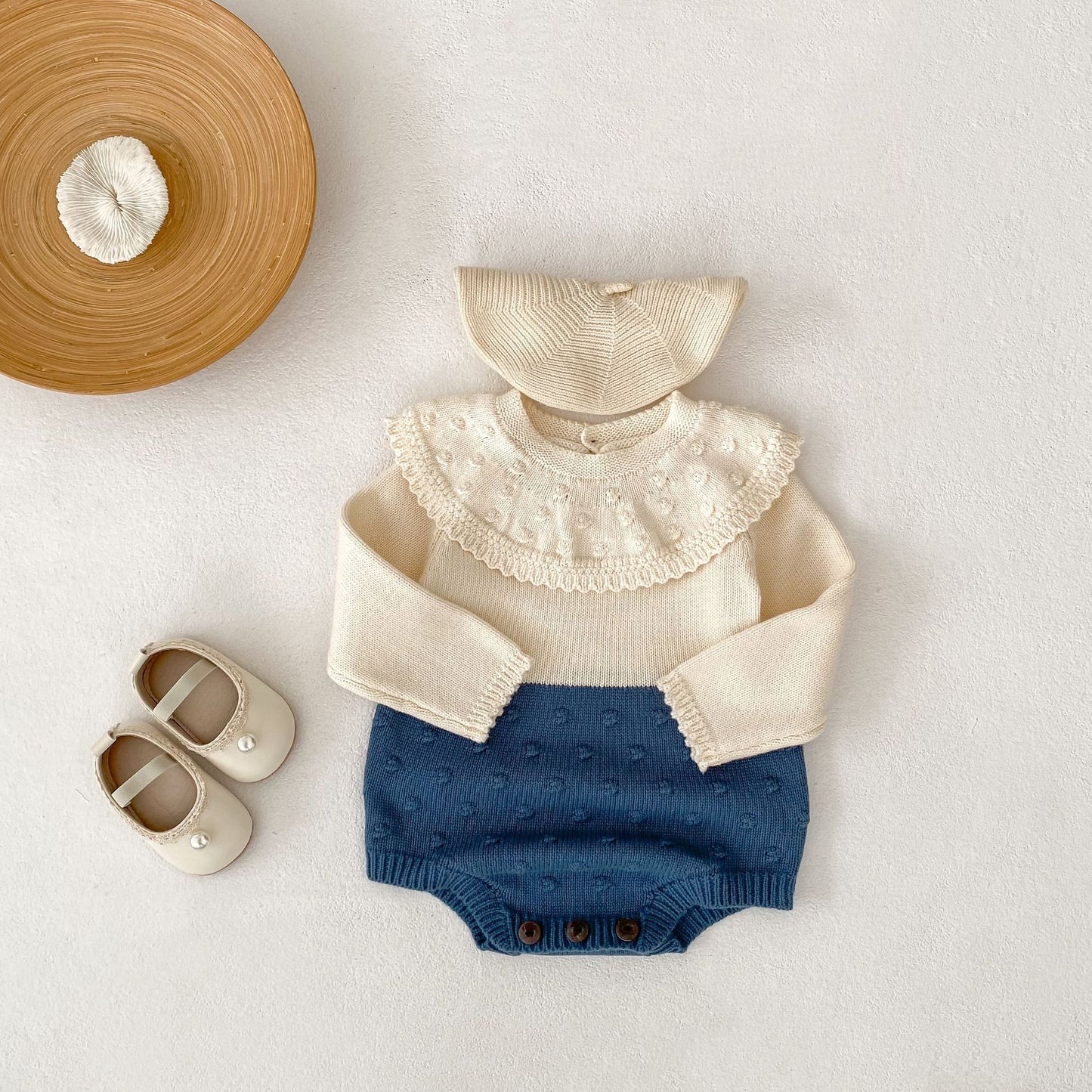 ヨーロピアンバイカラーニットロンパース