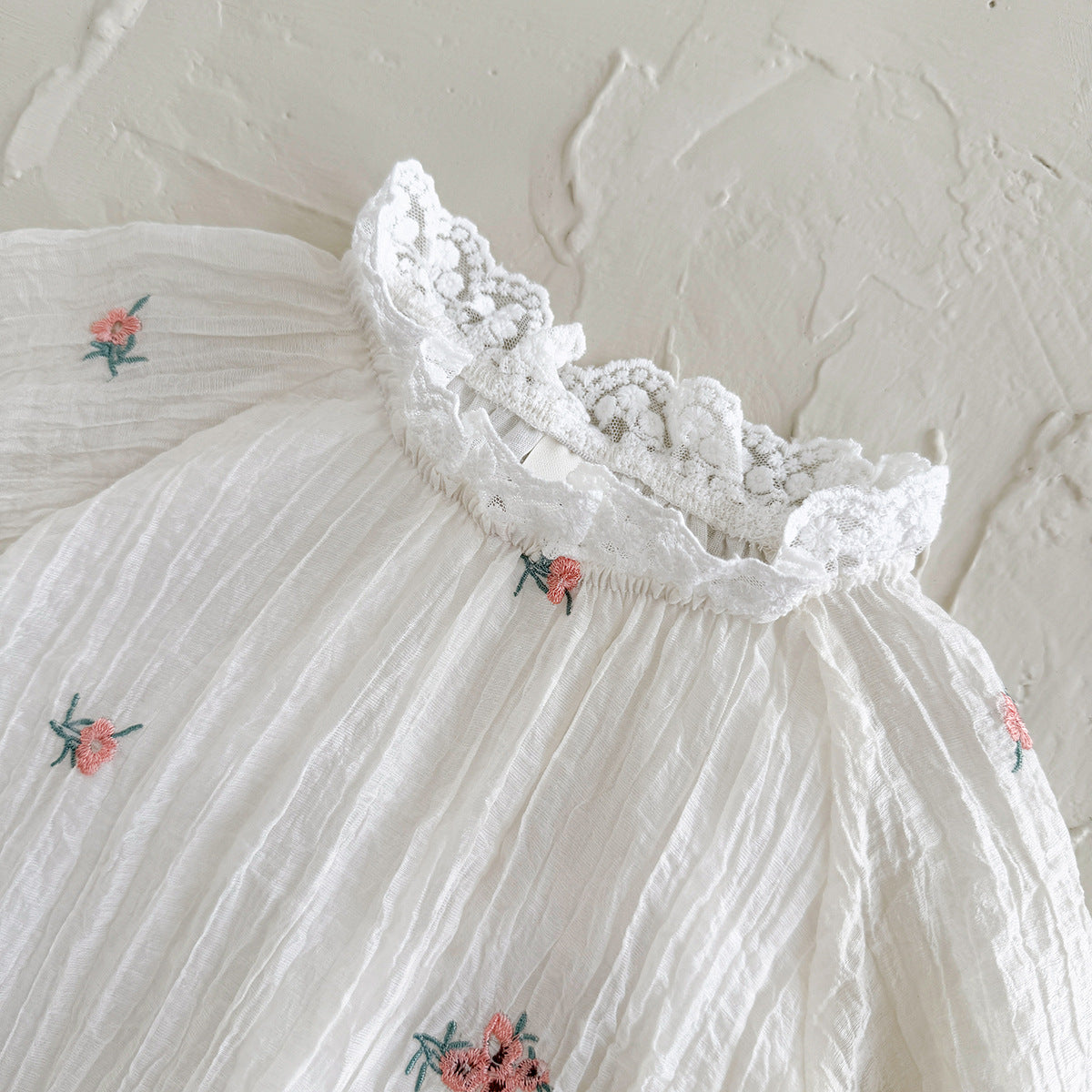 くしゅくしゅお花刺繍ロンパース