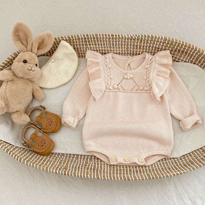 パステルピンクフリルニットロンパース