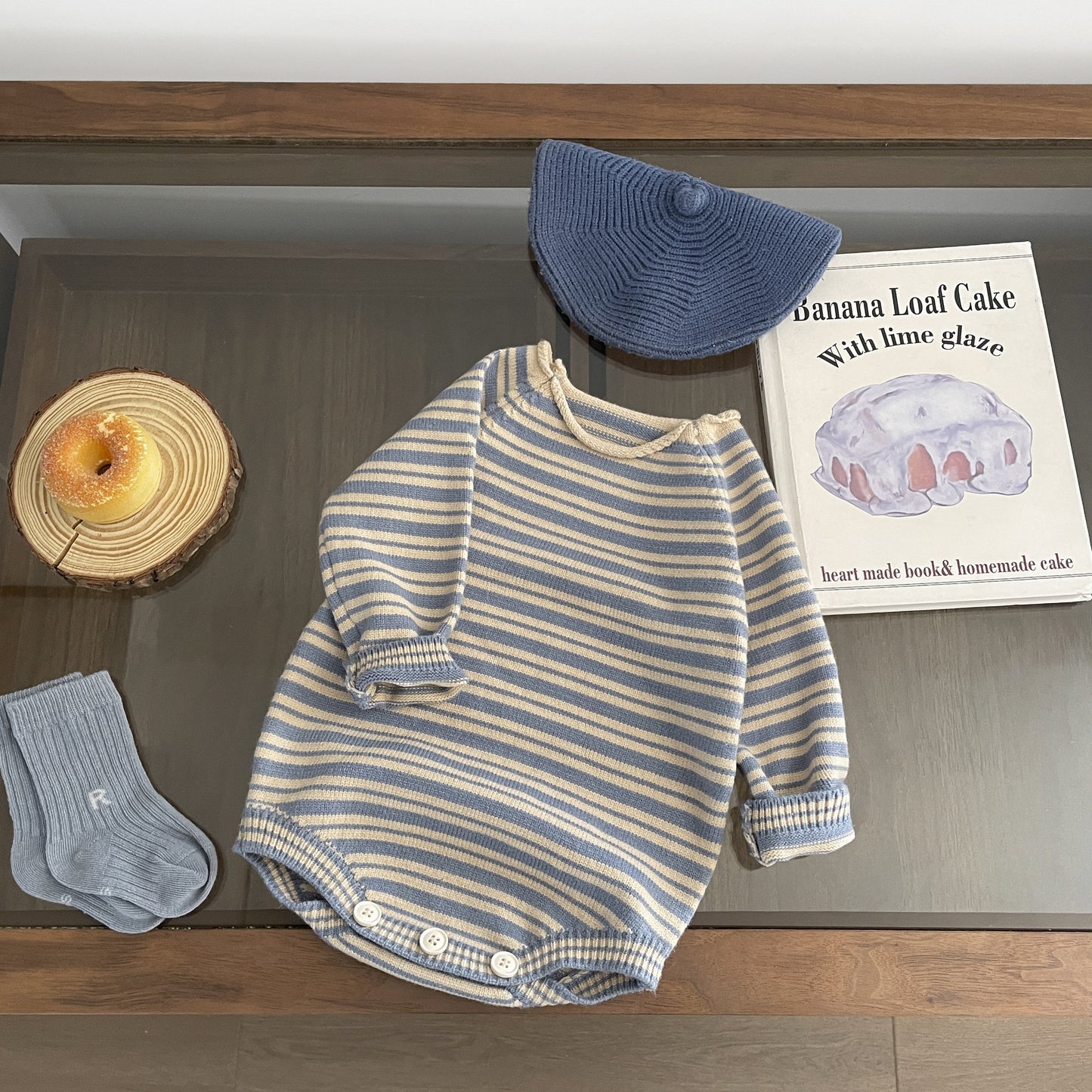 こっくりブルーニットボーダーロンパース