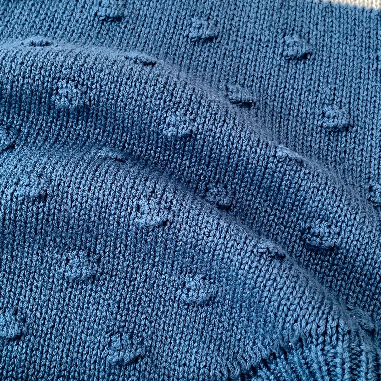 ヨーロピアンバイカラーニットロンパース