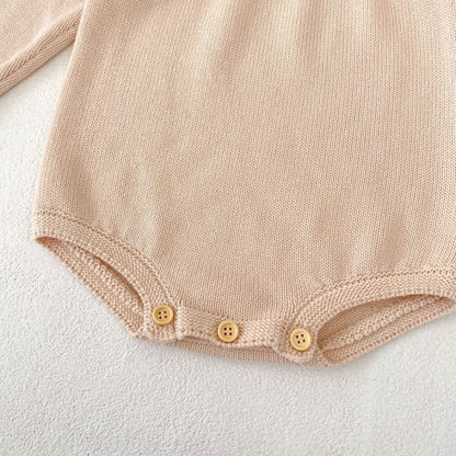 パステルピンクフリルニットロンパース